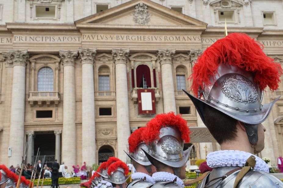 Swiss guards stand in St. Peter's Square before the Easter celebrations at the Vatican on Sunday, March 31. Pope Francis led his first Easter Sunday celebrations with a Mass marking the holiest day in the Christian calendar.