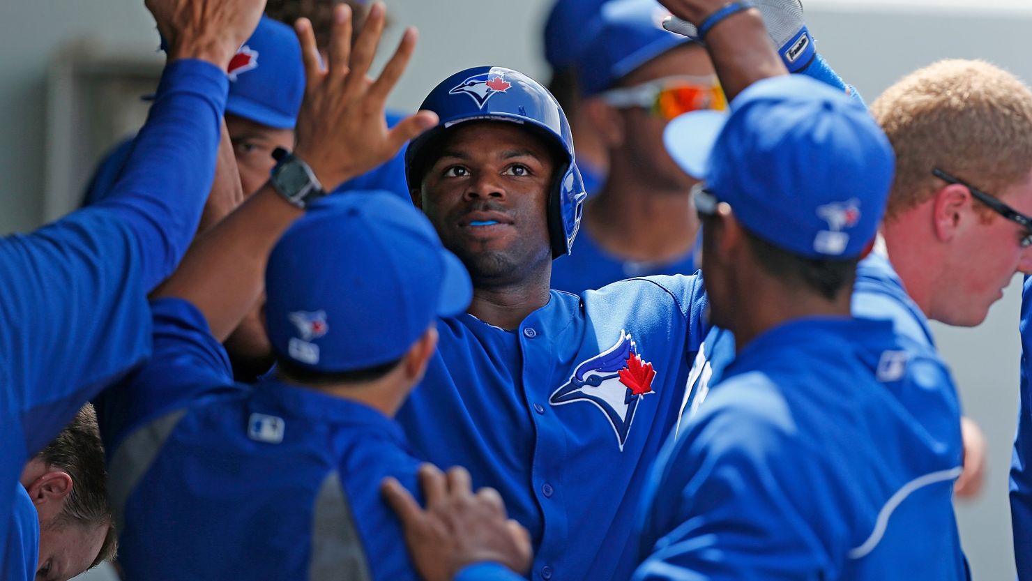Rajai Davis of the Toronto Blue Jays is congratulated after a home run in a spring training game last week in Fort Myers, Florida.