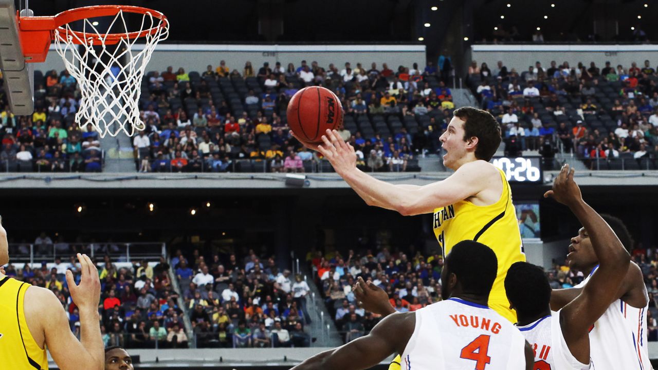 Nik Stauskas of Michigan shoots over Florida on March 31.