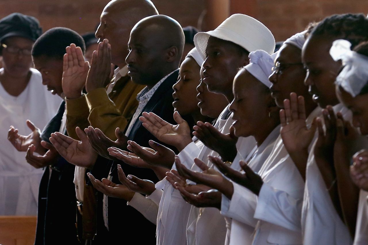 Congregants pray during Easter services at Regina Mundi Catholic Church in the Soweto area of Johannesburg, South Africa, on March 31.
