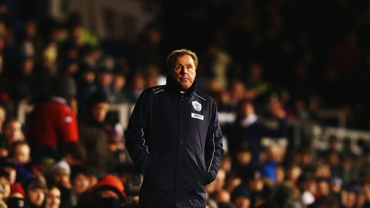 Harry Redknapp looks on alone as his QPR side gift the game to Fulham before launching a late fightback in vain