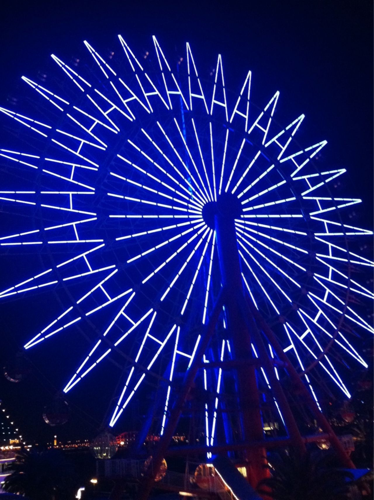 The big Ferris wheel in the Harborland in Kobe, Japan, lights up in 2012 for World Autism Awareness Day.