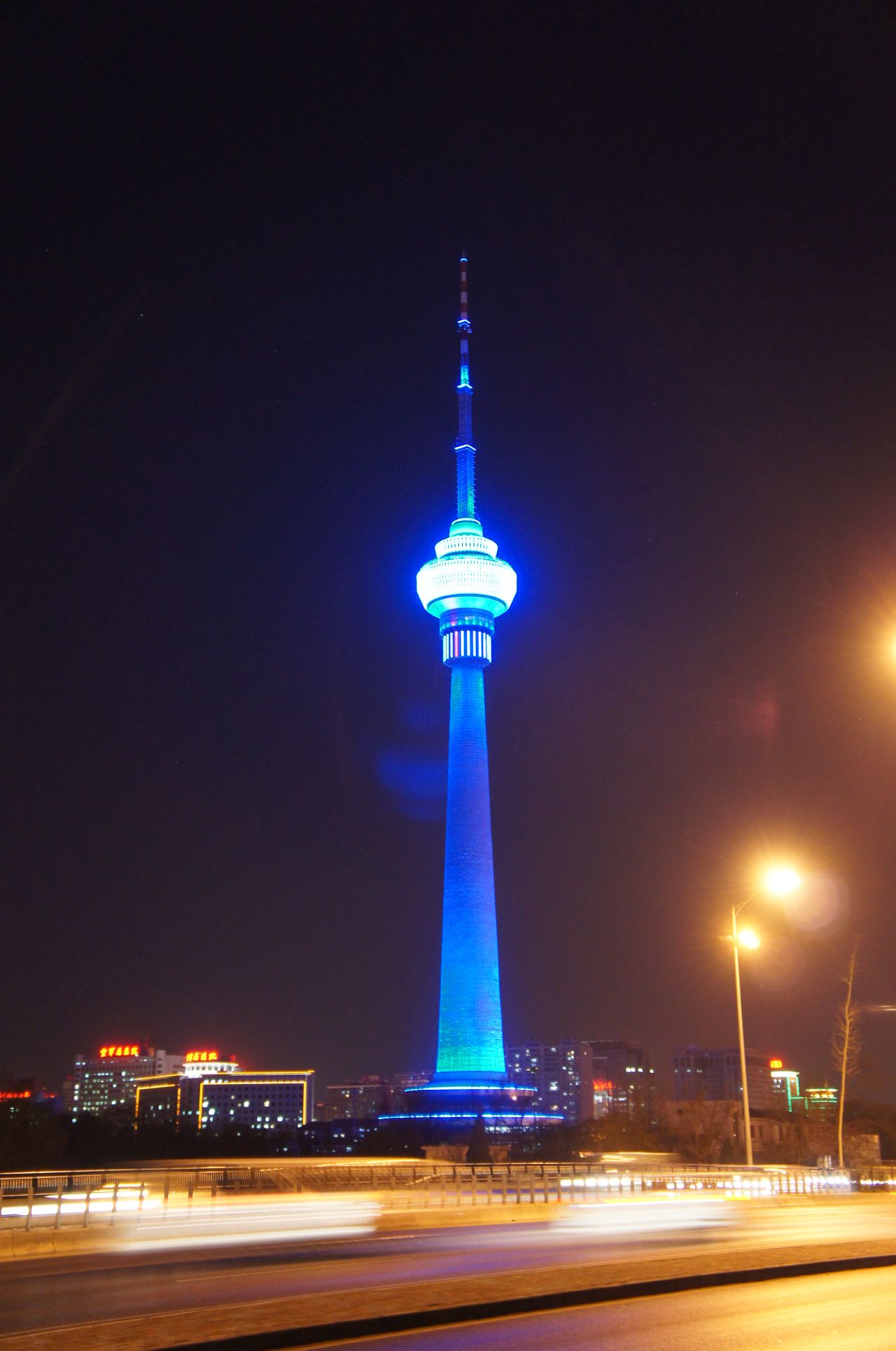The China Central Radio & TV tower (CCRT) in Beijing lights up for the 2012 World Autism Awareness Day.