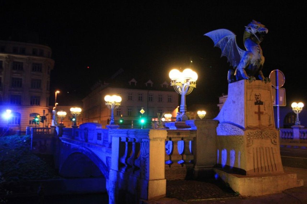The Dragon Bridge in Ljubljana, Slovenia, is illuminated to commemorate World Autism Awareness Day in 2012.