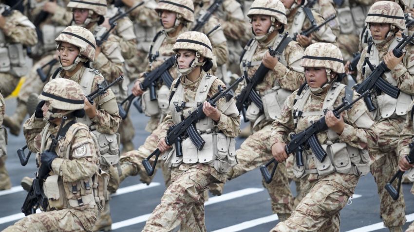 Peruvian Army female members march during a military parade on July 29, 2012 in Lima.