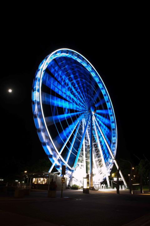 The Wheel of Brisbane in Brisbane, Australia, lights up blue for the 2012 World Autism Awareness Day.