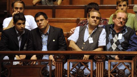 Gay couples observe the Senate's discussion of a bill on same-sex marriage in Montevideo, Uruguay, on Tuesday.
