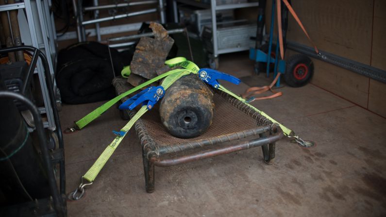 A <a href="http://www.cnn.com/2013/04/03/world/europe/germany-berlin-bomb/index.html">defused World War II bomb</a> sits securely after its removal alongside a rail line near Berlin's central railway station Wednesday, April 3. The 220-pound device was a Russian aerial bomb dropped during the war, police said. Many unexploded bombs dropped by the Allies remain undiscovered in Berlin and other German cities nearly seven decades later.<br />