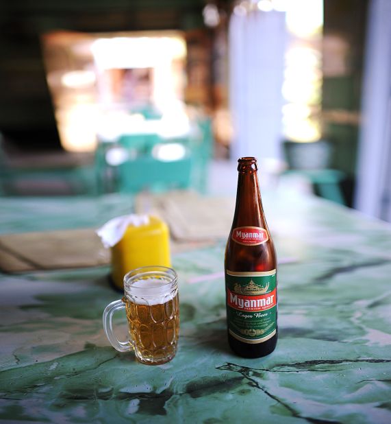 When the Burmese want to get a waiter's attention they make a kissing sound, usually two or three short kisses. It's the sort of sound you might make if calling a cat. Myanmar's national beer is cleverly called  ... Myanmar Beer.