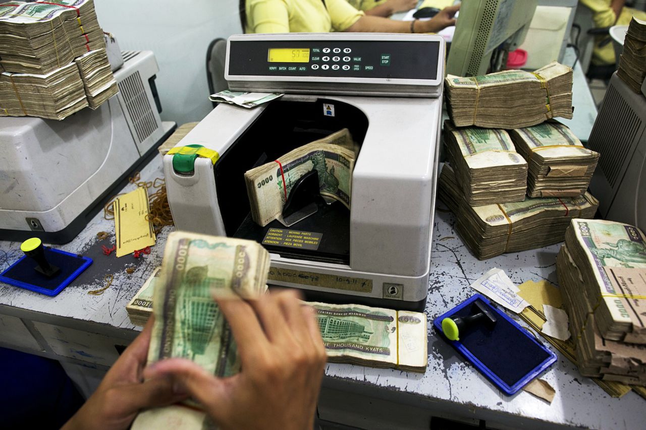 There are few ATMs in Myanmar, so visitors need to bring plenty of U.S. dollars. The higher the denomination, the better the exchange rate. This whole stack of kyat (pronounced "chat") is worth about US$20. 