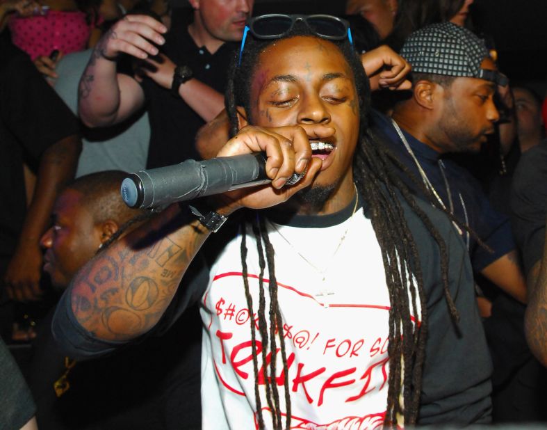 Rapper Lil Wayne has tons of tattoos. Among them are the words "fear" and "God," which have been etched on his eyelids.