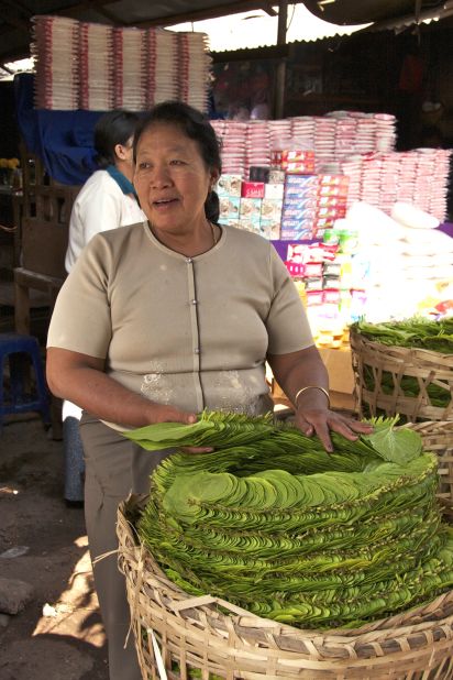Chewing betel nut is a national pastime. Small street stalls, like this one in Mandalay, selling the palm-sized green leaves are everywhere. The leaves are filled with betel nut, spices and sometimes a pinch of tobacco, then folded and popped in the mouth and chewed.