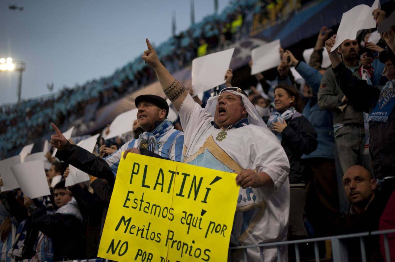 Malaga fans protested against UEFA president Michel Platini over threats to refuse the club permission to play in European competition. The protests were ignored and despite appeals to the Court of Arbitration for Sport, Malaga was handed a one-year ban.