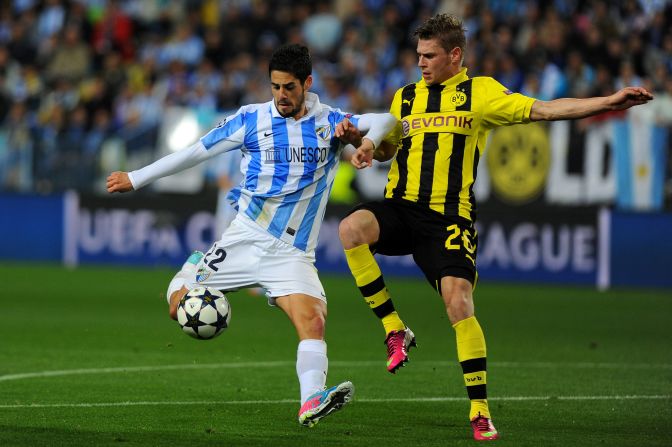 Dortmund's Lukasz Piszczek had his hands full up against Malaga's talented midfielder Isco in a hard-fought affair in Spain. Malaga, which is playing in the competition for the first time in its history, was given a rough ride by the German side.