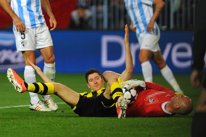 Dortmund's Polish striker Robert Lewandowski wasted a glorious opportunity to grab an away goal, while midfielder Mario Gotze also squandered a chance as the game finished goalless.