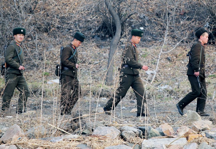 North Korean soldiers patrol near the Yalu River in April 2013.