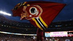   A Washington Redskins flag is waved prior to the NFC Wild Card Playoff Game against the Seattle Seahawks at FedExField on January 6, 2013 in Landover, Maryland. 