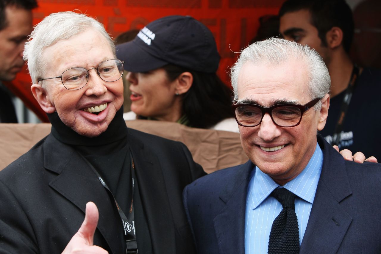 Ebert and director Martin Scorsese attend the 62nd International Cannes Film Festival in 2009. Ebert had cancer and lost part of his lower jaw in 2006.