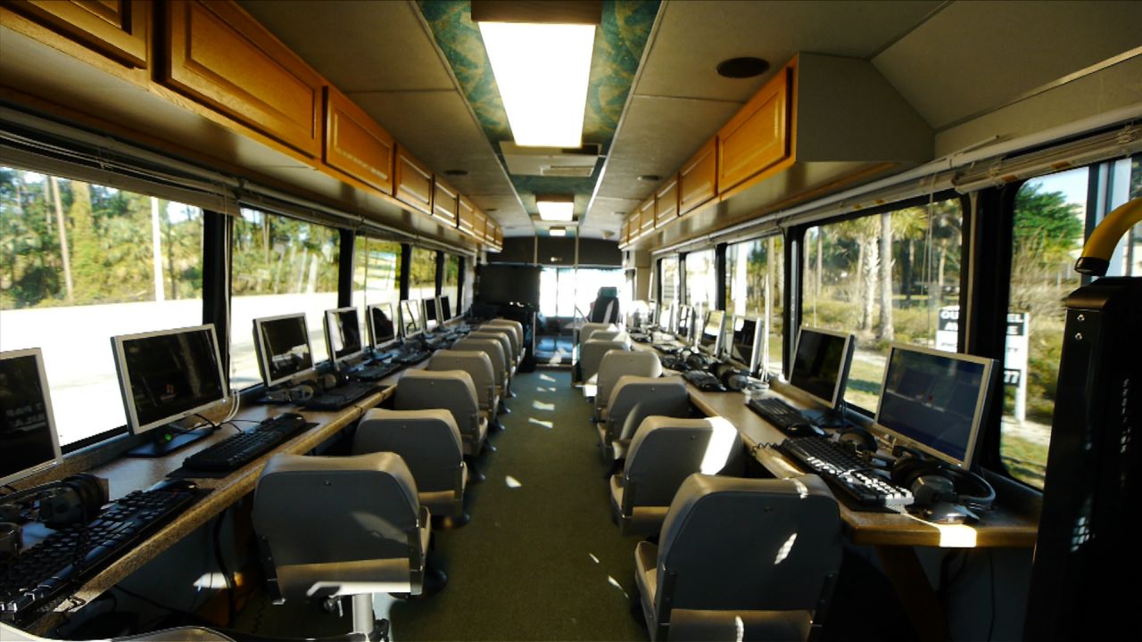 The custom-designed bus is outfitted with 17 computer stations that are connected to high-speed Internet via satellite.