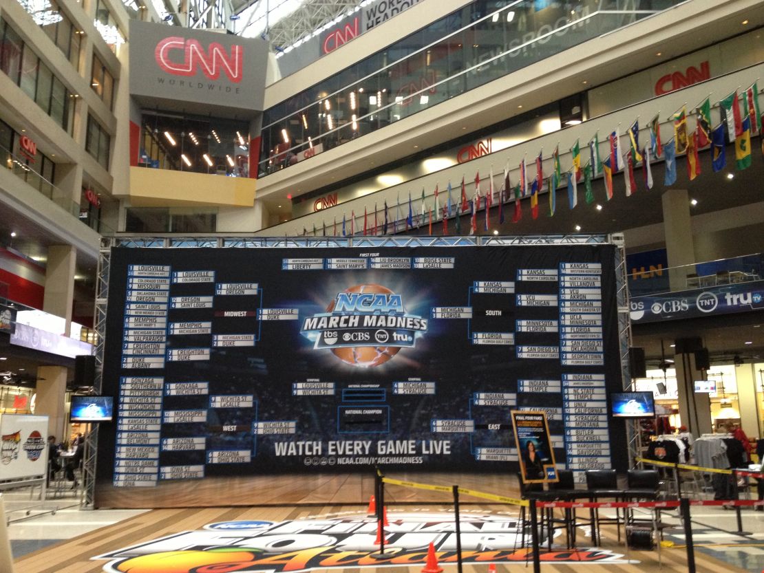 A giant March Madness bracket lives in the CNN Center atrium to remind visitors that they've absolutely lost their office pool.