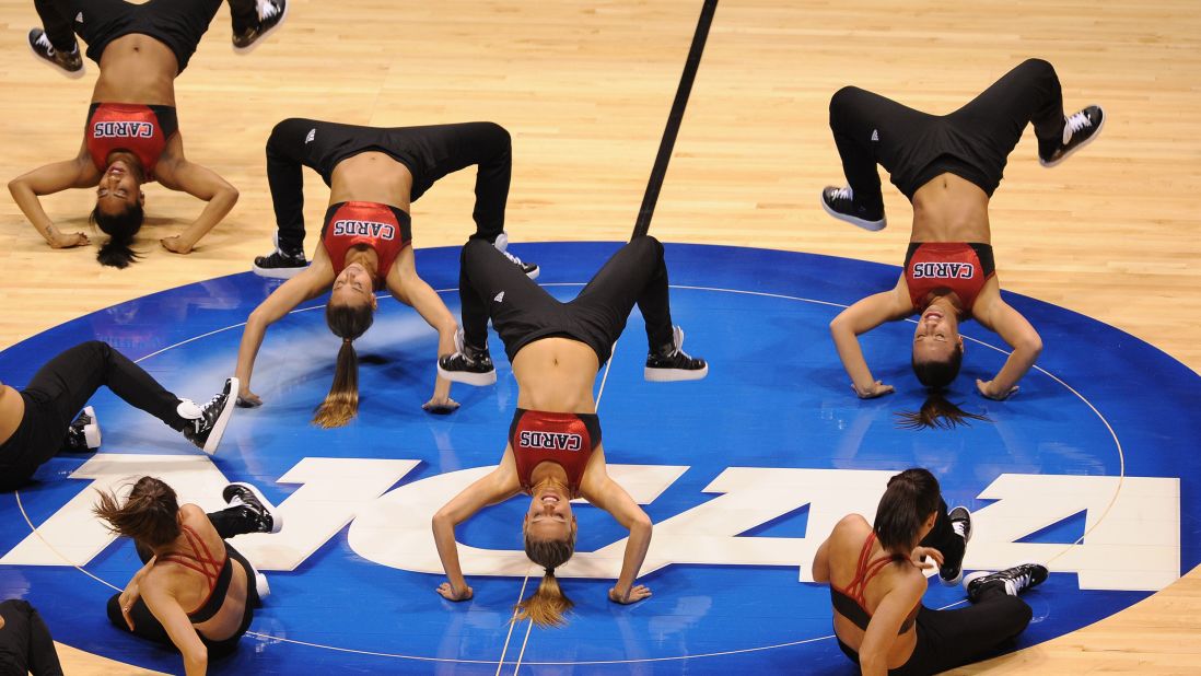 Louisville Cardinals cheerleaders perform during a game against the Oregon Ducks on March 29 in Indianapolis.