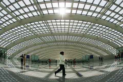 Beijing Capital International (pictured) is currently the busiest airport in China -- servicing 80 million passengers every year -- but will be nearing its operating capacity by the time the new facility is open for business. 