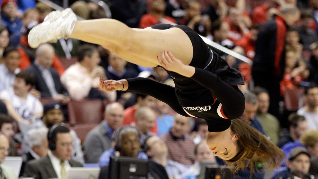 A Cincinnati Bearcats cheerleader performs in the first half during a break in the game against the Creighton Bluejays on March 22 in Philadelphia.
