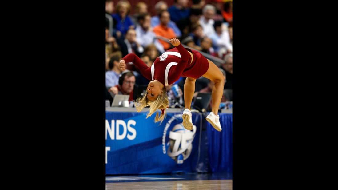  A cheerleader for the Oklahoma Sooners backflips on March 22 in Philadelphia.