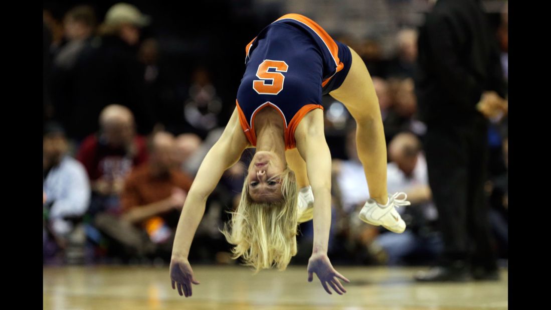 A Syracuse Orange cheerleader performs on March 28 in Washington.