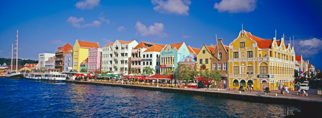 The World Heritage site of Willemstad, Curacao, owes its distinctive pastel shades to a Dutch governor's belief that the white walls of the town's buildings gave him headaches.  