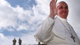 Pope Francis waves to the faithful as he arrives in St. Peter's square for his weekly audience on April 3, 2013 in Vatican City, Vatican.