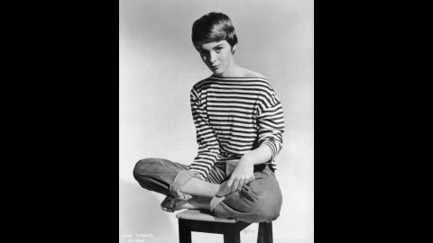 American actress Jean Seberg (1938-1979) helped popularize rolled-up blue jeans and French-striped sailor jerseys in the United States. The look became synonymous with tomboy style.