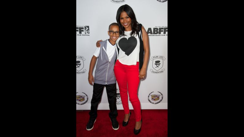 At 41, Nia Long welcomed her second child in November 2011. Long is shown here with her first child, Massai Dorsey II.