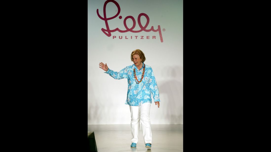 Designer Lilly Pulitzer died on Sunday, April 7, at the age of 81, according to her company's Facebook page. The Palm Beach socialite was known for making sleeveless dresses from bright floral prints that became known as the "Lilly" design. Pictured, Pulitzer waves to the audience after the showing of her Spring 2003 collection.