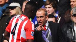 New Sunderland manager Paolo Di Canio talks to Alfred N'Diaye before the kickoff against Chelsea.