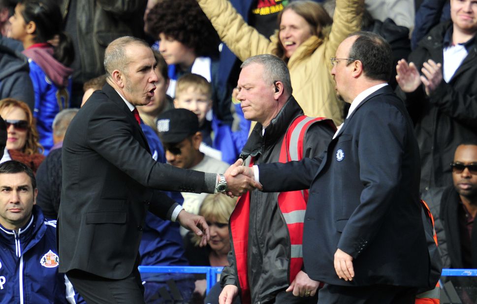 Di Canio's appointment took some of the pressure off Chelsea manager Rafael Benitez, right, who is unpopular with the club's fans due to past incidents when he was at Liverpool.