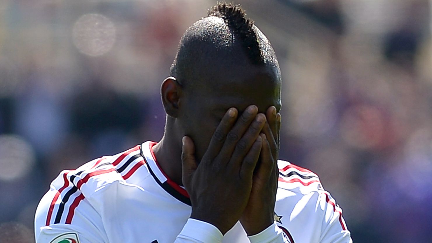 AC Milan striker Mario Balotelli was booked in Sunday's 2-2 draw with 10-man Fiorentina, incurring a suspension. 