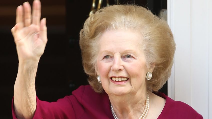 Former British Prime Minister Margaret Thatcher waves to the press at her home, after leaving Cromwell Hospital on November 1, 2010 in London, England.