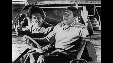 Reagan and Thatcher take a golf cart around Camp David in December 1984.