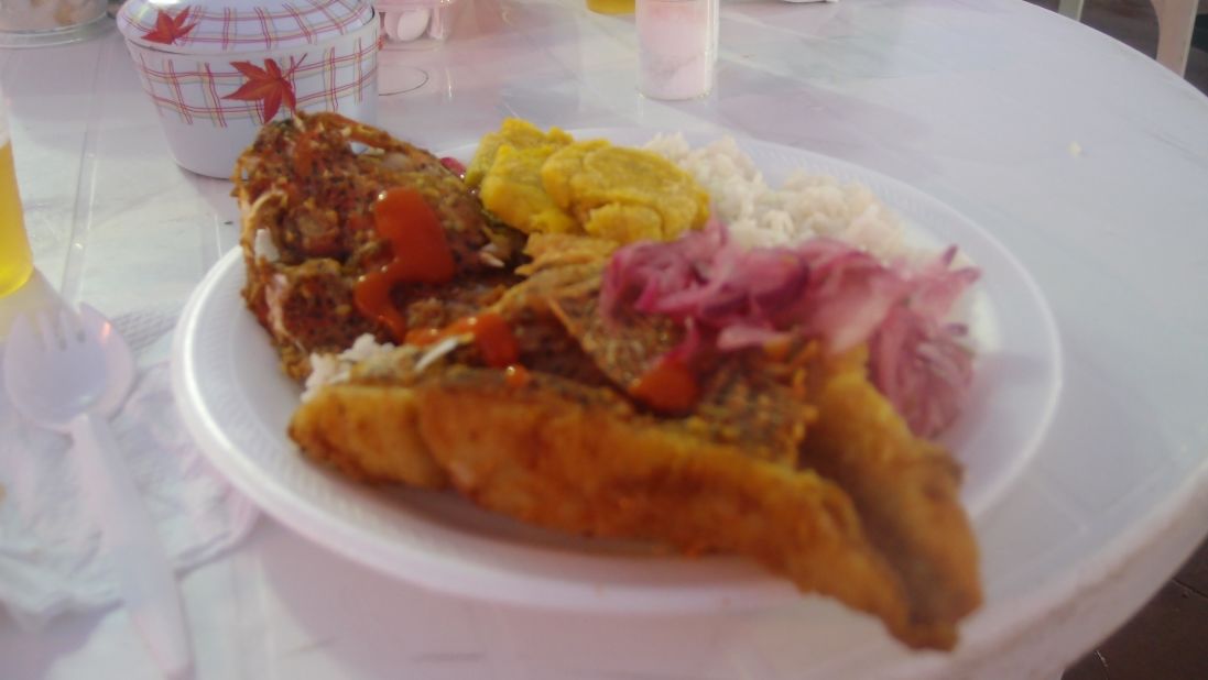 While traveling through the Galapagos, <a href="http://ireport.cnn.com/docs/DOC-944284">Caroline Cheung</a> found a makeshift eatery in front of a fishing pier. She stopped there for lunch because she wanted to try the local eats. "It was a whole fish that was previously marinated, then dipped in a batter and deep fried to crispy perfection," she said.