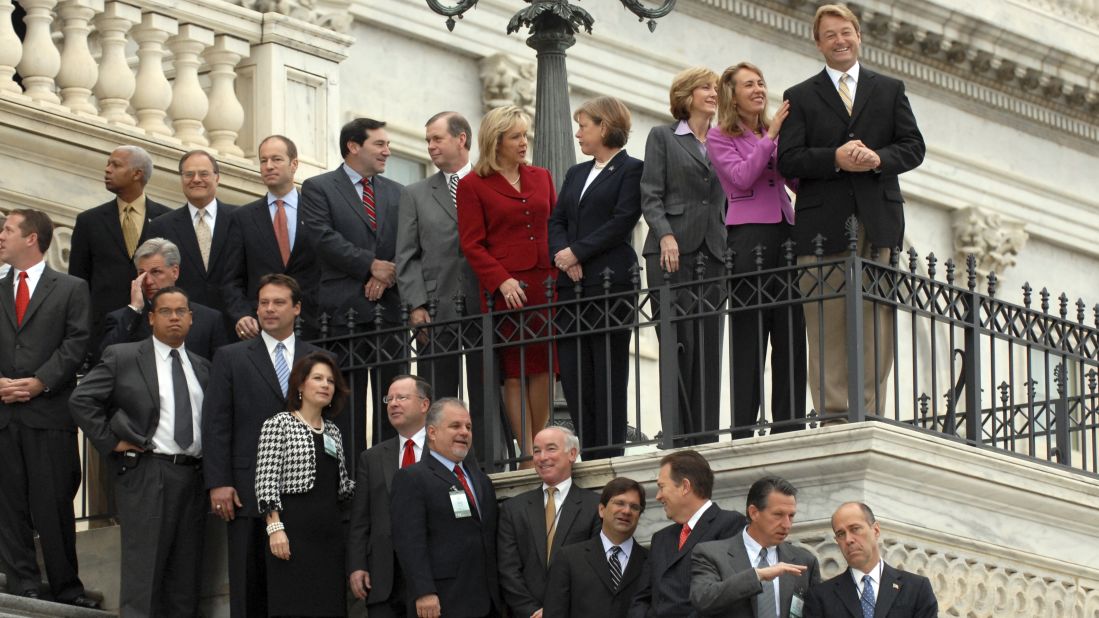 Newly elected US representatives — including Giffords, second from top right — prepare for a freshman class picture on the House steps in 2006. Giffords, a Democrat, represented Arizona's 8th District from 2007 until her resignation in 2012.