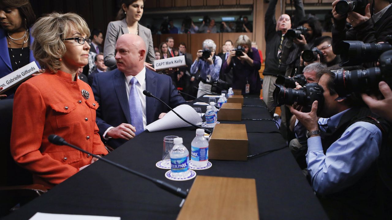 Giffords and Kelly arrive for a Senate Judiciary Committee hearing about gun control on Capitol Hill in Washington on January 30, 2013. The former congresswoman delivered an opening statement to the committee, which met for the first time since the mass shooting at a Sandy Hook Elementary School in Newtown, Connecticut.