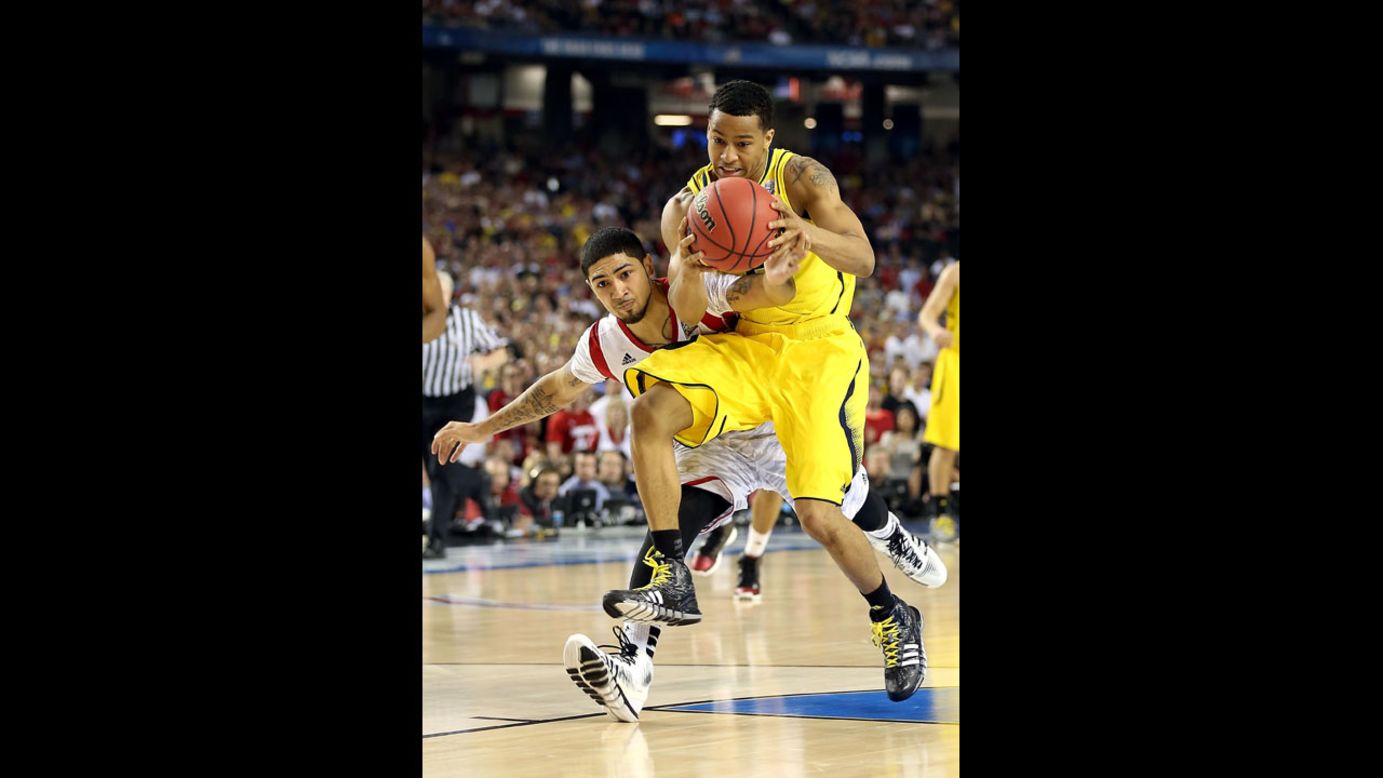 Peyton Siva to Trey Burke on title game play: 'It was a good block' 