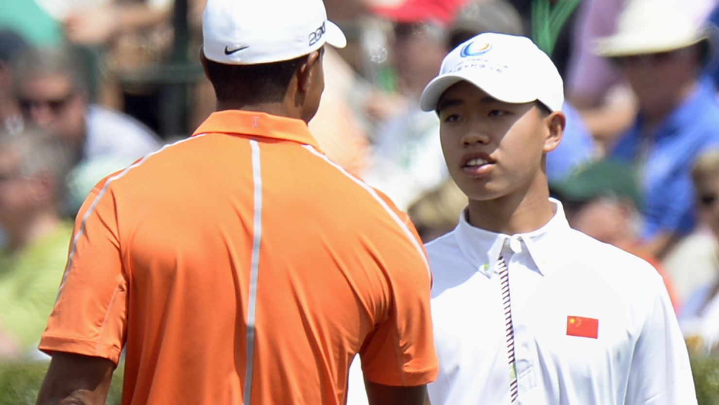 Guan Tianlang (right) will become the youngest player to ever compete in the Masters.