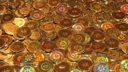 Stock images of physical Bitcoins that are available for purchase from the website www.casascius.com. Bitcoin is a decentralised digital currency.
