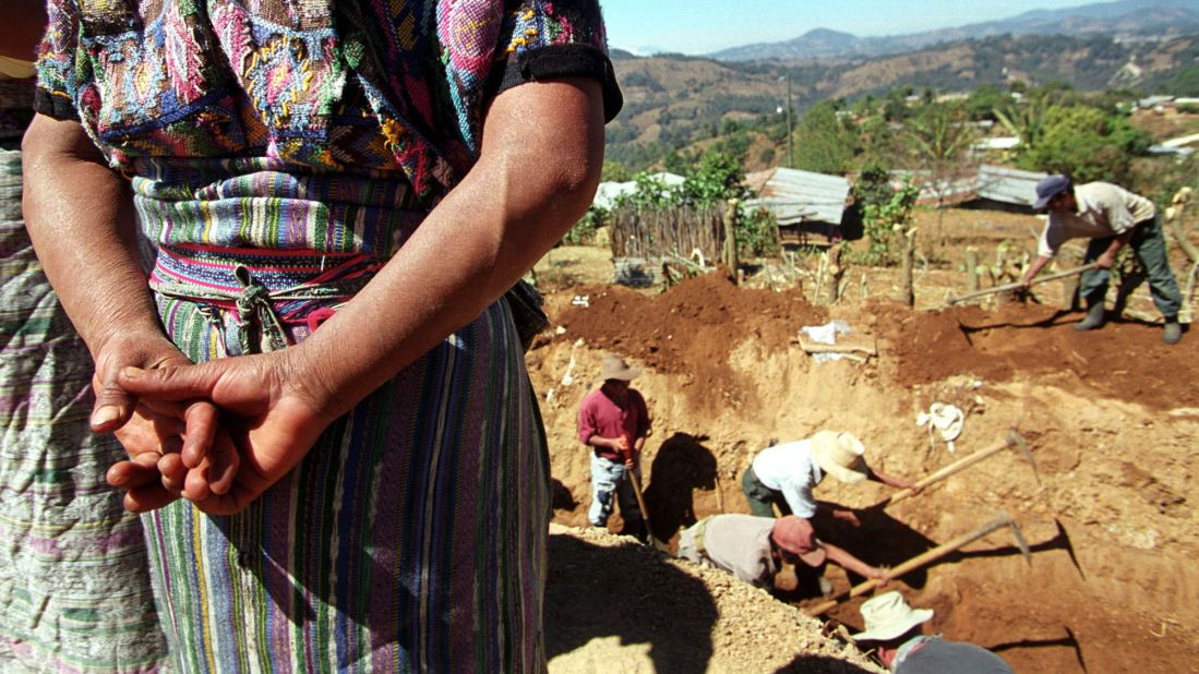 In March 2002, archaeologists in Xiquin Senai, Guatemala, exhume people's remains from a massacre that is alleged to have taken place during the country's civil war.