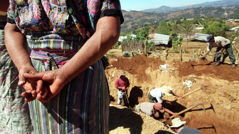 In March 2002, archaeologists in Xiquin Senai, Guatemala, exhume people's remains from a massacre that is alleged to have taken place during the country's civil war.