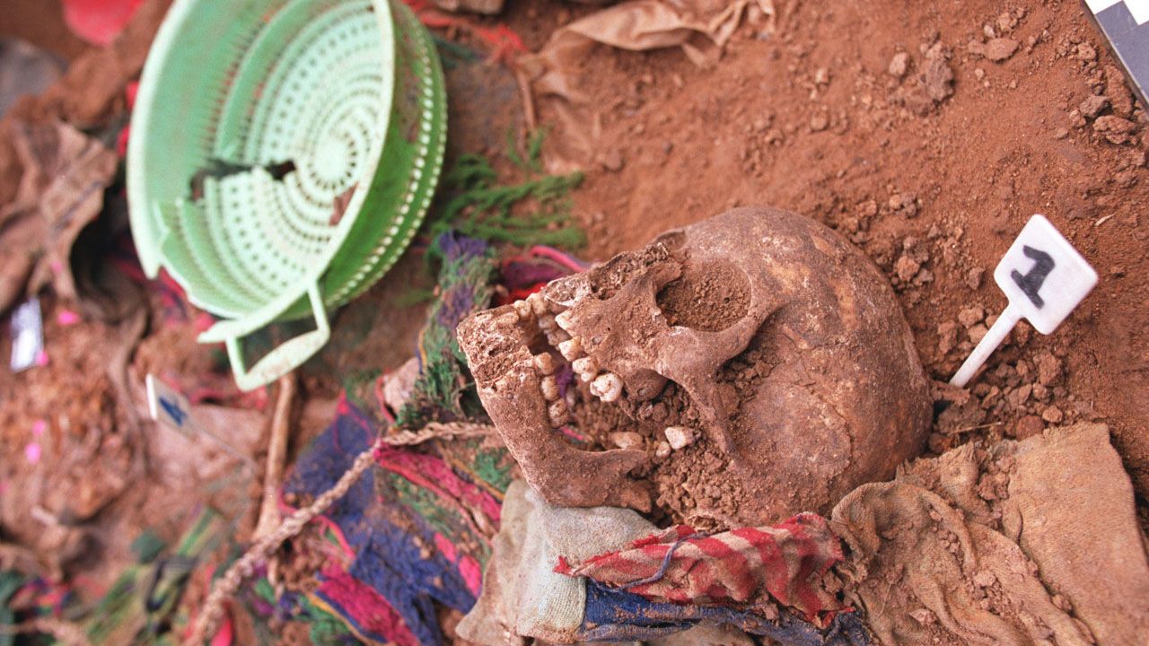 Following the 2002 exhumation, ceremonies were held to properly bury the dead.