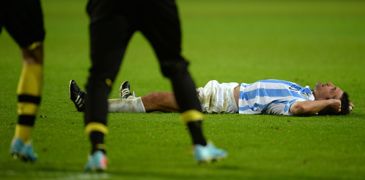 Malaga midfielder Jeremy Toulalan was left floored after his side's painful late defeat. The Spanish club, which was making its debut in the competition, was just minutes away from the semifinals.