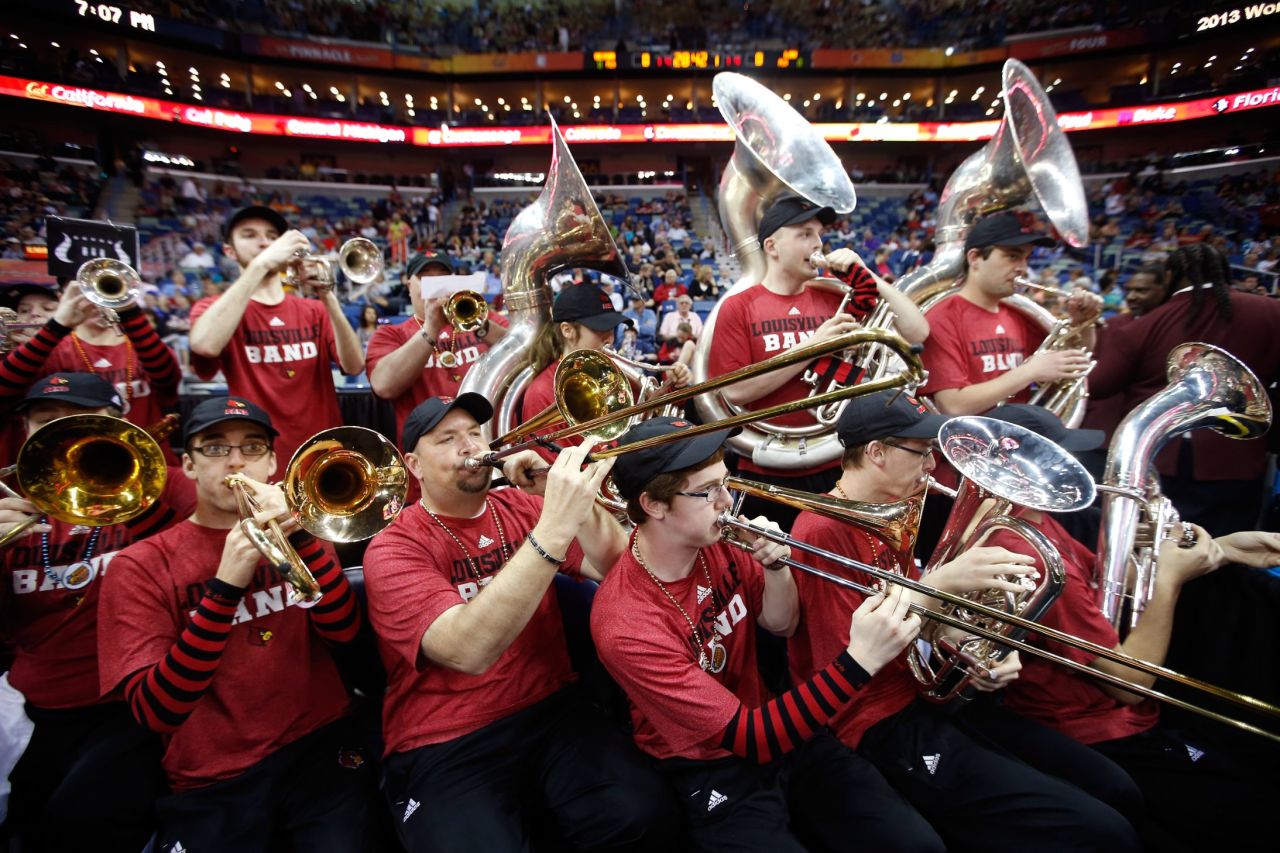 Members of the Louisville Cardinals band perform on April 9 during the game against the Connecticut Huskies in New Orleans.